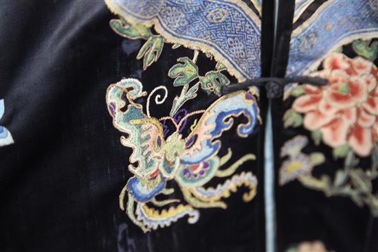 A Chinese black satin robe, 19th century, some wear